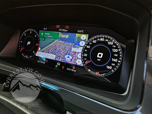 DigiDash digital dashboard showing a full-width sat nav map between the dials