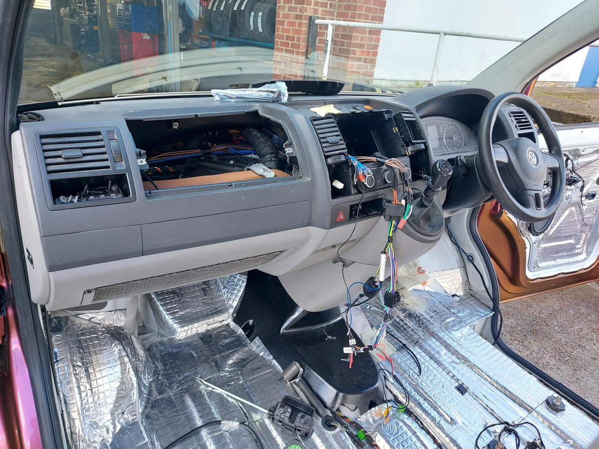 VW Transporter dashboard stripped out during an Everest VW install