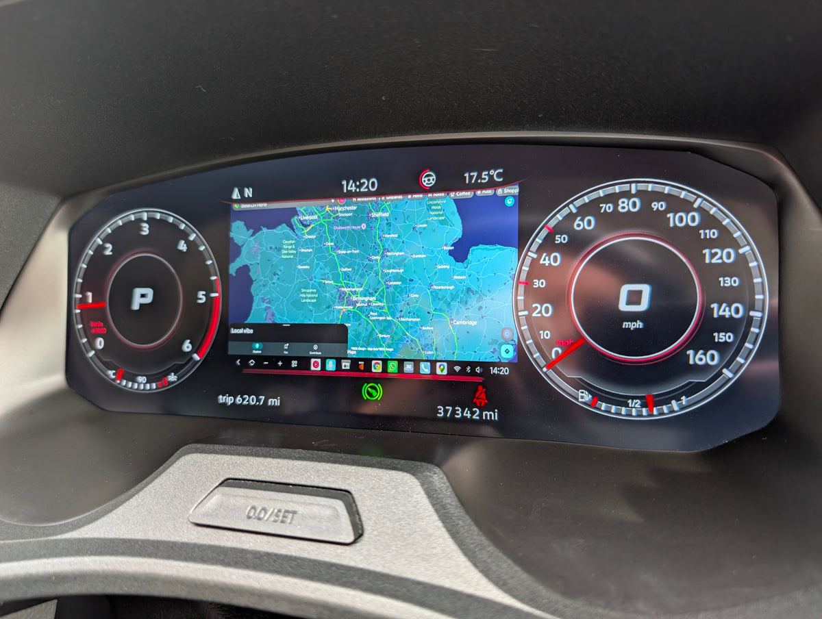 DigiDash digital dashboard showing a full-width sat nav map between the dials